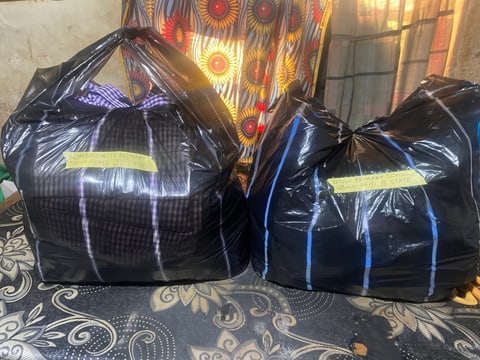 Two large bags packed with gifts, ready to be given